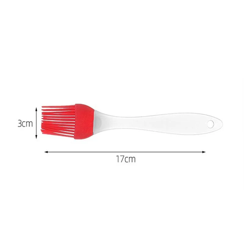 Silicone cooking utensils including tongs, an oil brush, and a spatula