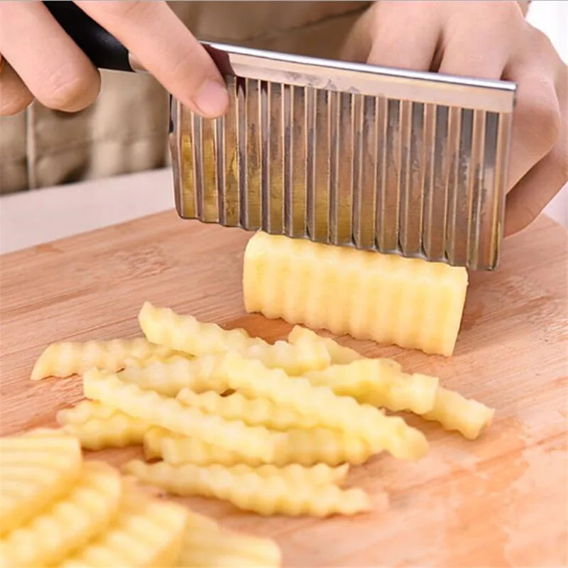 Stainless steel kitchen knife with a wavy edge