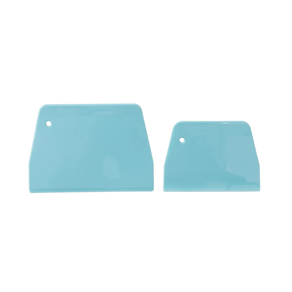 Two plastic spatulas for baking