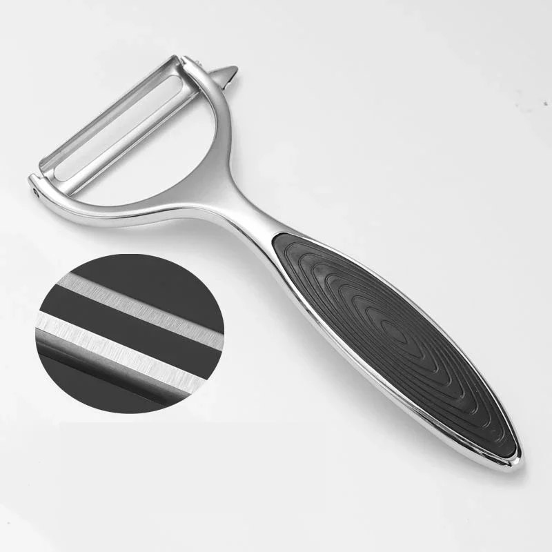 Handheld stainless steel peeler with flat and jagged blades