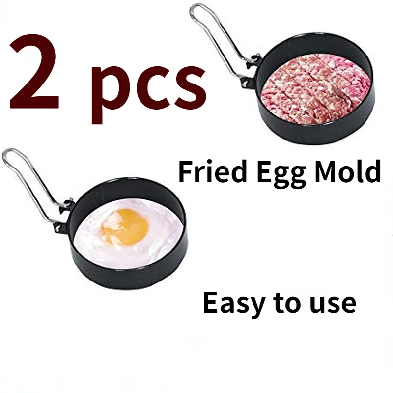 Two black stainless steel rings for shaping eggs and pancakes