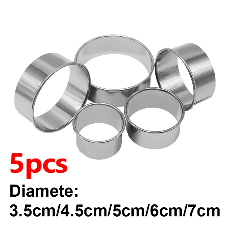 Five round stainless steel cutters in different sizes